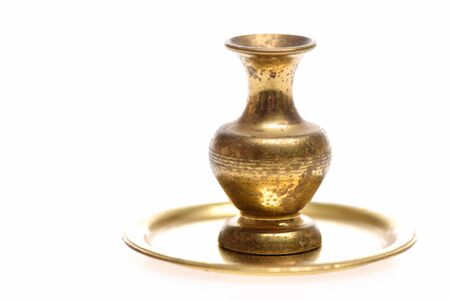 Antique vase. Golden bowl on tray isolated on white background, copy spaceの写真素材