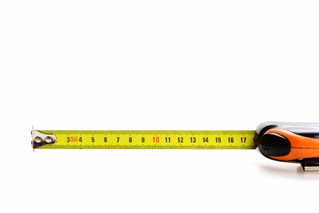 Concept of professional equipment and metering precision: deployed tape measure in bright colors,...