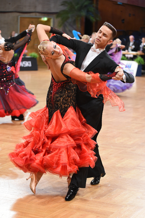 Stuttgart, Germany - August 15, 2015: An unidentified dance couple in a dance pose during Grand Slam Standart at German Open Championship, on August 15, in Stuttgart, Germanyのeditorial素材