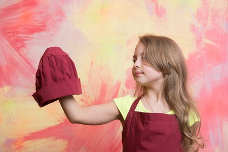 cooking and eating, childhood and happiness, beauty and fashion, cook and chef, little girlの写真素材