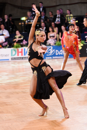 Stuttgart, Germany - August 14, 2015: An unidentified latin female dancer in a dance pose during Grand Slam Latin at German Open Championship, on August 14, in Stuttgart, Germanyのeditorial素材