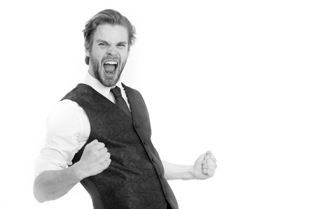 An elegant bearded happy shouting and successful business man in waistcoat isolated on white background, copy space, black and whiteの写真素材