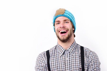 Man in hat laughs, isolated on white background. Winter clothing conceptの写真素材