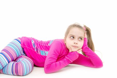 Child in pink sportswear. Sport and success. Workout of small girl isolated on white background. Education and energy. Fitness and health, sport.の写真素材