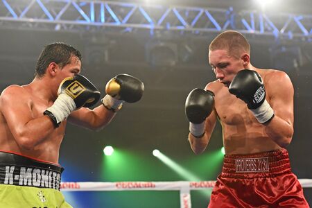 Kyiv, Ukraine - September 16, 2017: An unidentified boxers in the ring during fight for ranking points in the NSC Olimpiyskiy, Kyiv, Ukraineのeditorial素材