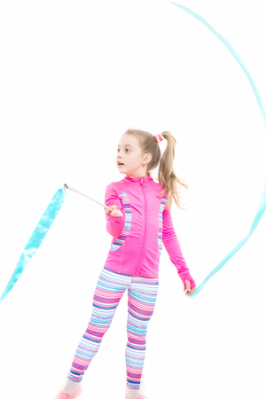 Fitness and health, sport. Education and energy. Sport and success. Workout of small girl isolated on white background. Child in pink sportswear.の写真素材