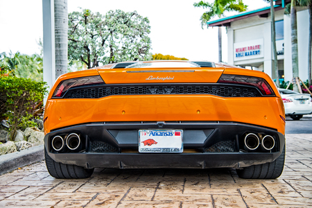 Miami, Florida, USA-February 19, 2016: Supercar Lamborghini Aventador orange color parked next to Ocean drive at South bech at Miami, Florida. Lamborghini is famous expensive automobile brand carのeditorial素材