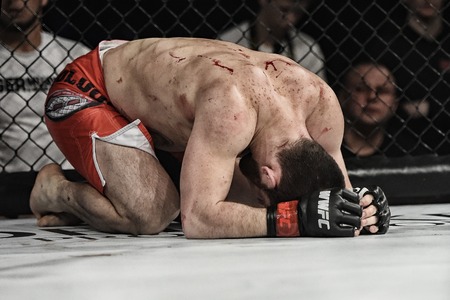 Kyiv, Ukraine -March 13, 2017: mma fighters fight at the ring fight at the championship in Palace of sport in Kiev, Ukraineのeditorial素材