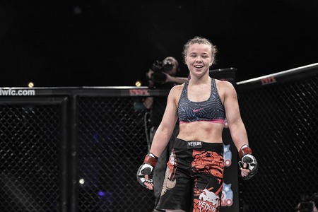 Kyiv, Ukraine -March 13, 2017: mma female fighters fight at the ring fight at the championship in Palace of sport in Kiev, Ukraine powerfuf girls or women fighters fight for mma champions beltのeditorial素材