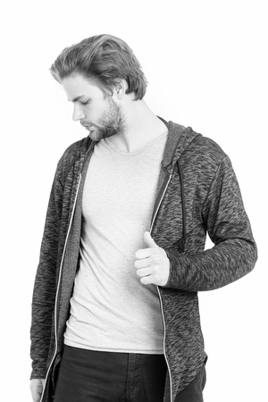 Fashion model isolated on white. Guy with beard and stylish hair. Man in grey jersey. Athletic man in sportswear. Sport and fashion.の写真素材