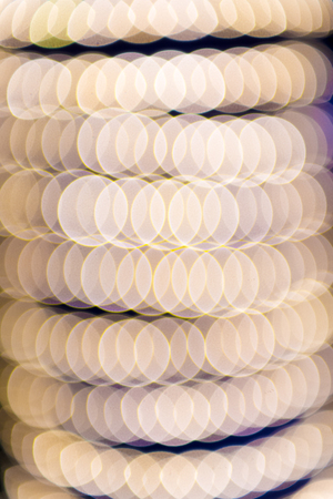 Bokeh lights glow on abstract background in Dubai, United Arab Emirates.の写真素材