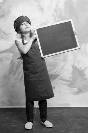 cooking and eating, childhood and happiness, beauty and fashion, cook and chef, marketing and advertisement, business and study, menu design, little girlの写真素材