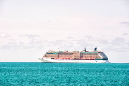 Great Stirrup Cay, Bahamas - January 08, 2016: cruise ship in blue sea on white sky. Water transport, vessel, transportation. Vacation, wanderlust, travel. Adventure, discovery, journey.のeditorial素材