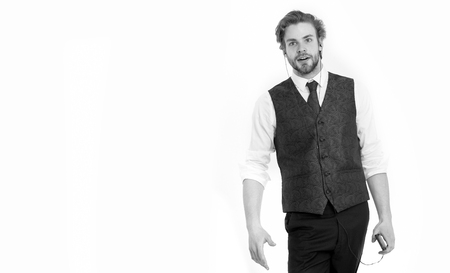 man with beard in formal outfit listen music on mp3 or mobile phone isolated on white, copy spaceの写真素材