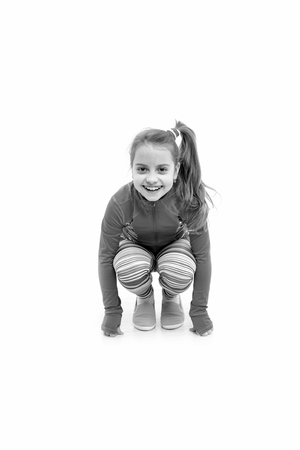 Child in pink sportswear. Education and energy. Workout of small girl isolated on white background. Fitness and health. Sport and success., sportの写真素材