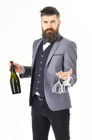 Waiter sommelier with bottle of red wineの写真素材