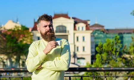 Man with long beard enjoy coffee. Morning coffee concept. Bearded man with espresso mug, drinks...