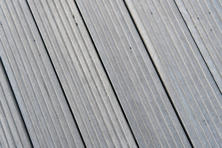 Floor of grey boards in reykjavik, iceland. Wood floor texture outdoor. Timber surface on wooden background. Flooring background with nobody. deck and plank.の写真素材