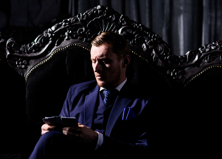 Broker in elegant suit looks fashionable, respectable.