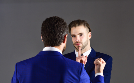 Disagreements in business concept. Boss and employee speaking atの写真素材