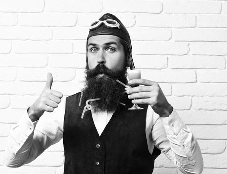 surprised handsome bearded pilotの写真素材