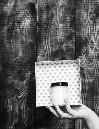 female hand holding heartの写真素材