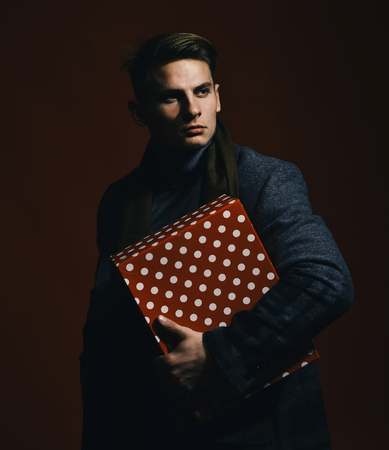 Have a nice day. Man in vintage style with gift box. Macho with present