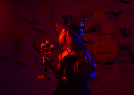 Halloween party concept. Girl with busy face on bloody redの写真素材