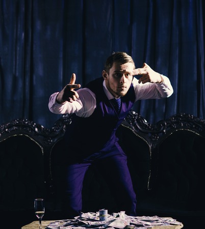 Man, businessman, boss with strict face threat to killの写真素材