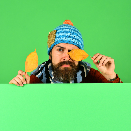 October and November time idea. Man in hat closes eyeの写真素材