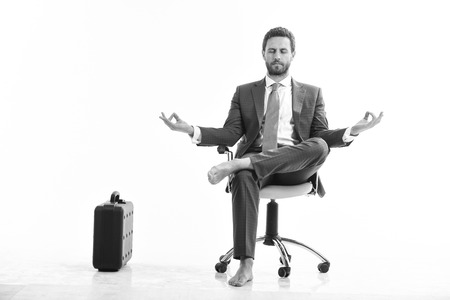 Businessman gets rid of stress and relaxing after working day.の写真素材