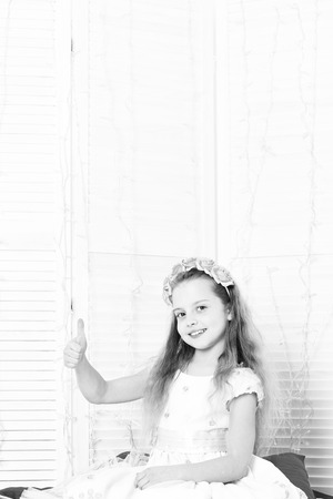 Pretty Girl. cute blonde girl with flowersの写真素材