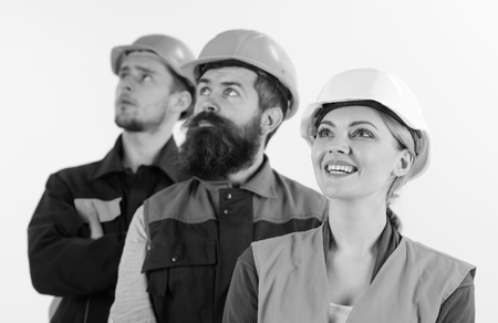 Team of architects, builders looking at same direction,の写真素材