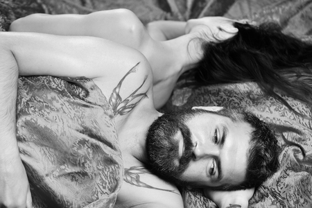 Man with beard and seriuos face has romantic morningの写真素材