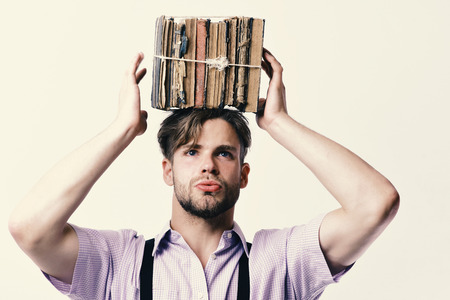 Wisehead syndrome and hard work concept. Man or student with bristle and busy face. Nerd or bookworm...