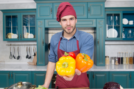 Buy in season. Peak season purchasing ensure your vegetables more flavorful. Seasonal vegetables ingredients can take average dish to another level. Fresh peppers vegetables in hand of chefの写真素材
