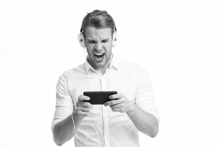 Music Always With Me Man Listening Favourite Song In Headphones With Smartphone And Singing Guy With Earphones Listens Music Man Screaming Face Enjoy Listening Music Isolated White Background の素材 Fy ストックフォトのamanaimages Plus