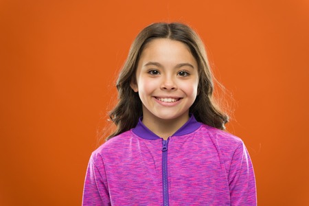 What is difference between phony and sincere smile. Girl cute child happy smiling face. Child long...