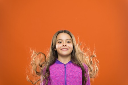 Kid girl long healthy shiny hair.