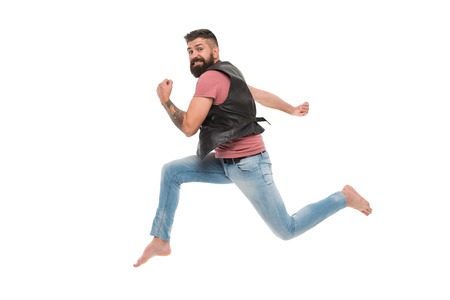 Guy bearded hipster captured in running motion isolated on whiteの写真素材