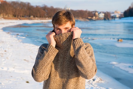 Winter landscape beauty. Man enjoy winter sunny day. Winter knitted clothes warming up. Winter...