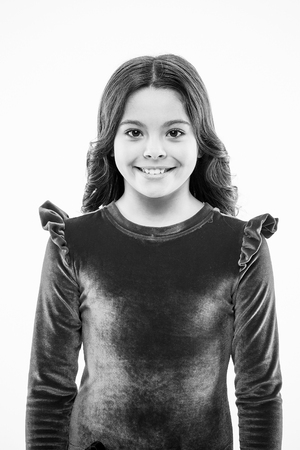 She got great style. Fashion girl. Adorable girl child in fashionable clothes. Little kid with stylish long hair. Happy small child. Fashion look of small model. Little fashionista.の写真素材