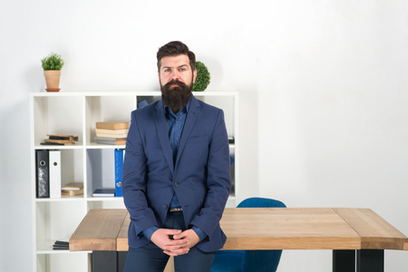 I am listening. Report and complaint concept. Man bearded hipster boss looking at you with attention. Ready to hear your opinion. Boss standing in office. Boss receive complaints. Meeting with boss.の写真素材