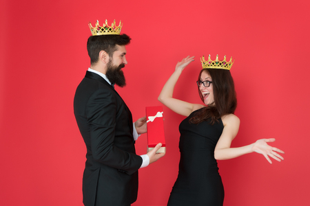 So happy. Formal couple. man in tuxedo and sexy woman. anniversary celebration. Bearded man and happy woman in crown. royal couple in love. date. fashion look. anniversary party. anniversary present.の写真素材