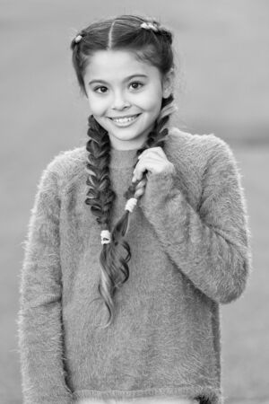 small girl child with perfect hair. Happy little girl. Beauty and fashion. small kid fashion. Childhood happiness. International childrens day. Developing new fashion line. Young expertise.の写真素材