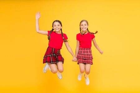 Simply being around. english style fashion. happy little girls in checkered skirt. beauty look....