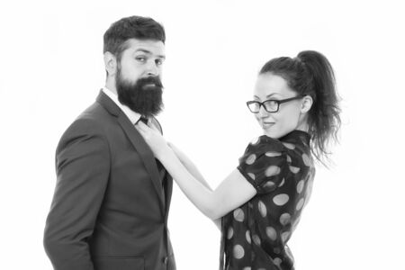 Help each other look perfect. Business partners man and woman adjust outfit before business...