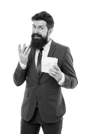 Ways to promote loyalty rewards program. Office party. Pleasant surprise. Gift for client. Man bearded hipster formal clothes hold gift box white background. Thankful concept. Gift for colleagueの写真素材