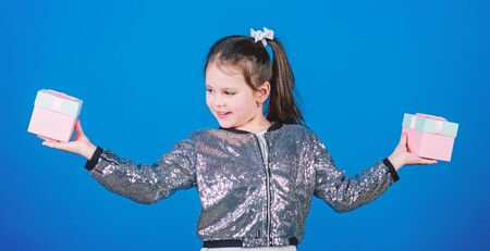 Girl with gift box blue background. Black friday. Shopping day. Cute child carry gift box. Surprise...