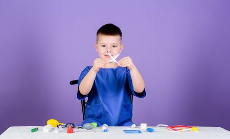 kid doctor with stethoscope. Treatment prescription. pediatrician intern. little boy in medical...
